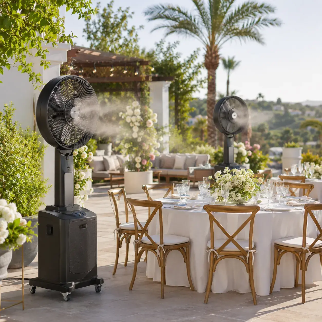 White event tent rental by Ramos Party Rentals with elegant tables, chairs, lighting, and shade for outdoor celebrations.